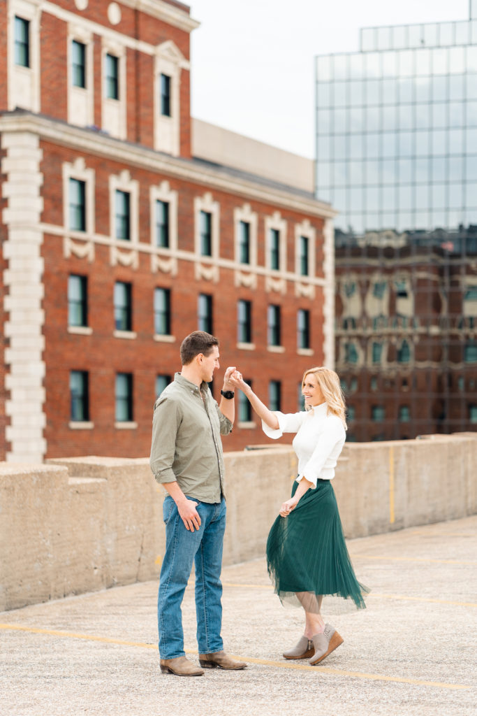 Dancing Chattanooga engaged couple during West Village photo shoot