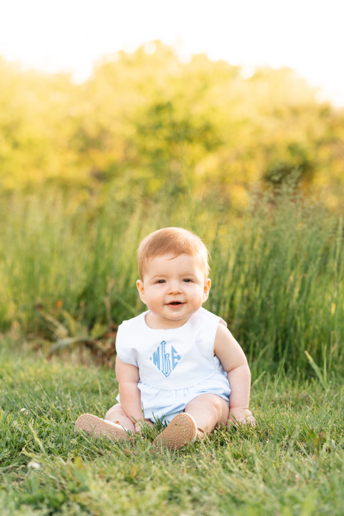 Chattanooga Family Photographer; milestone photos at Renaissance Park Chattanooga, TN - baby boy posing sitting - golden hour photography - baby boy classic photo shoot outfit