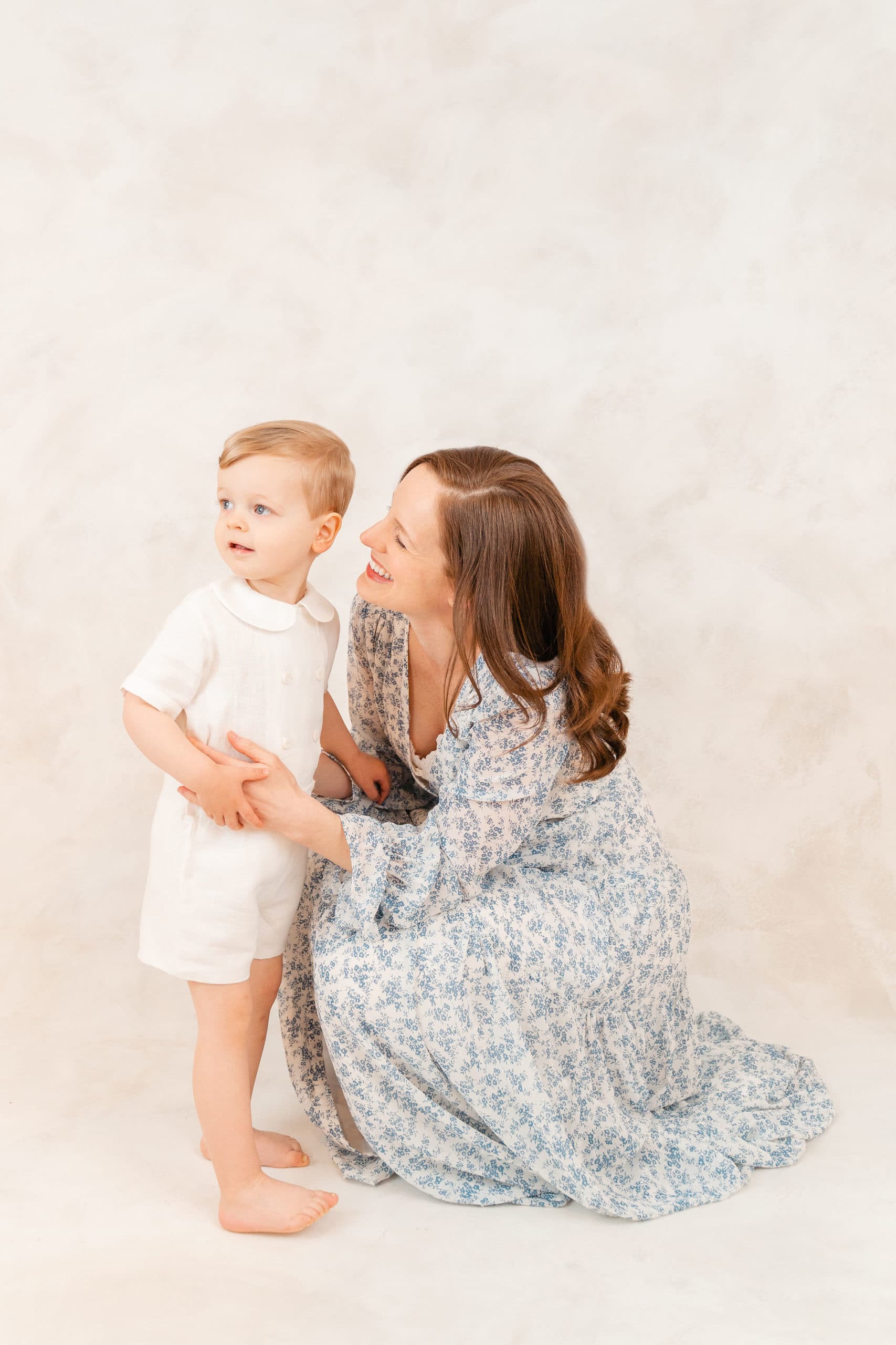 Mother and son during Chattanooga studio photography session with hand painted backdrop.