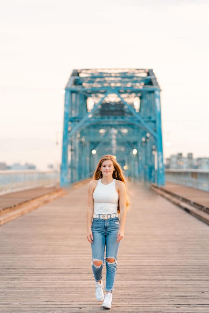 Senior Girl posing on Walnut Street Bridge in Downtown Chattanooga, TN