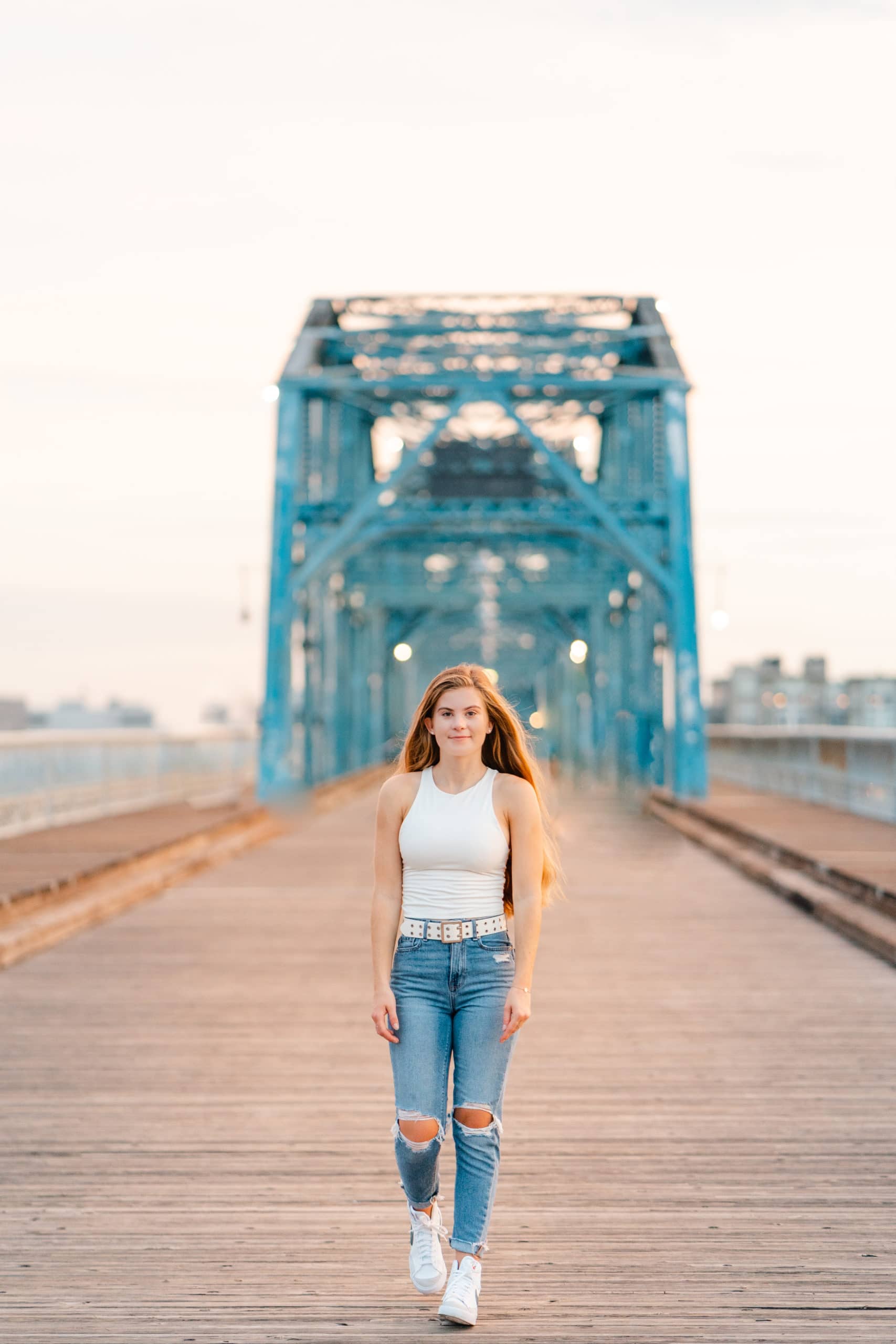 Senior Girl walking on Walnut Street Bridge, Tennessee River