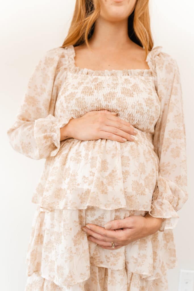 Bump photos in floral gown.