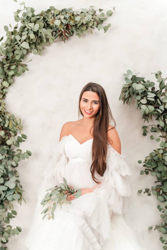 Styled maternity photography with white tulle luxury maternity gown from Salt Gowns