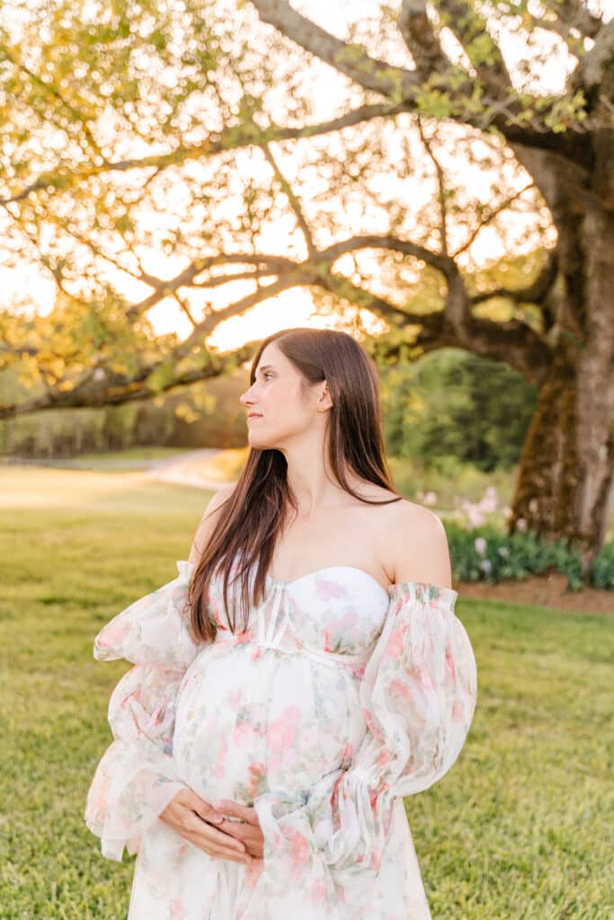Luxury Chattanooga Maternity Session at Kensington Cove Farm featuring luxury floral gown. Photographer who offers maternity and newborn photo packages.