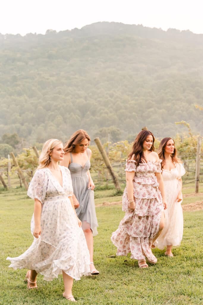 Models walking in North GA winery wearing dresses from Savannah Taylor Boutique