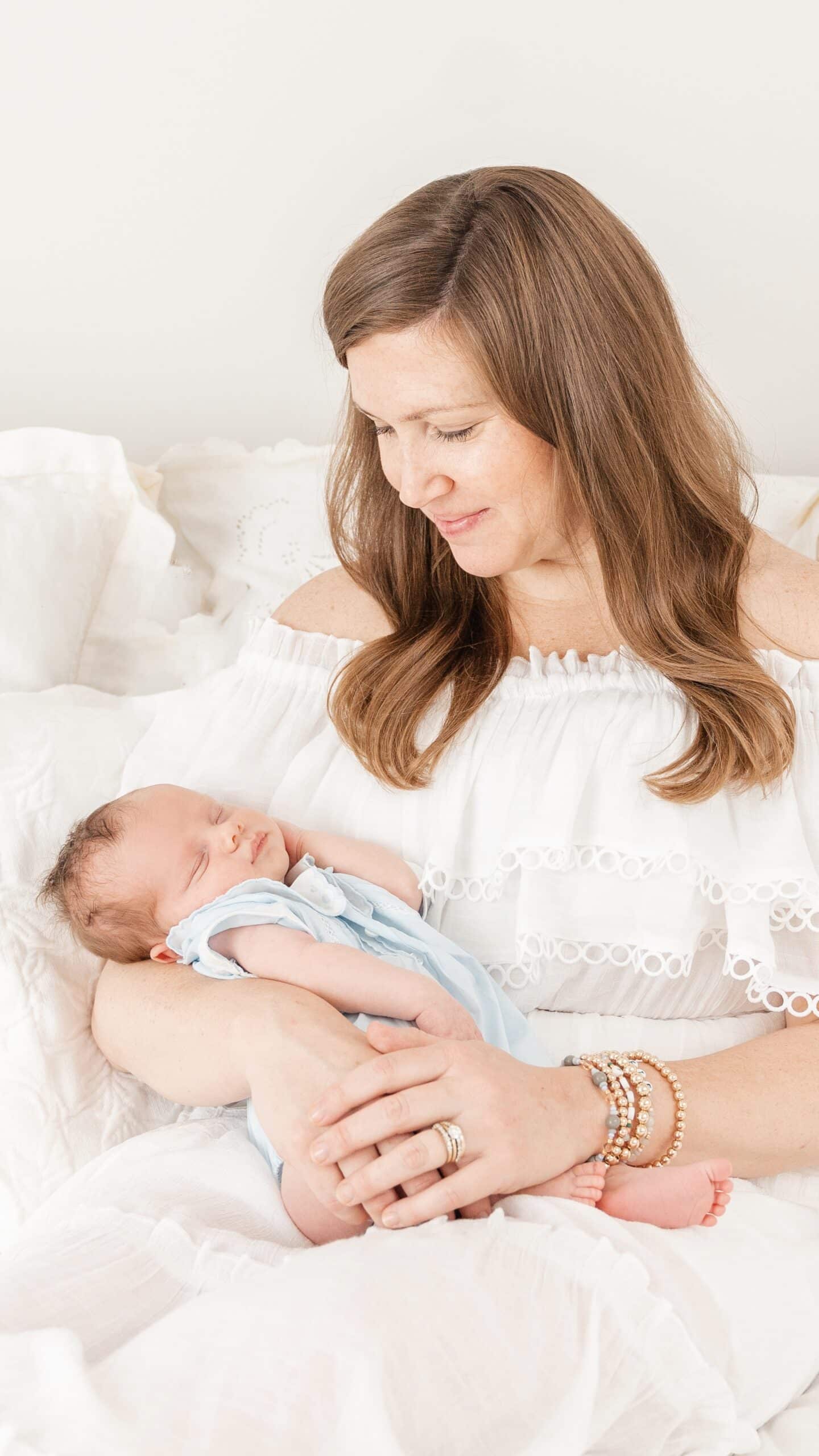 Tips for how to take light and airy indoor photos. Image of in-home newborn session with Godox Flash