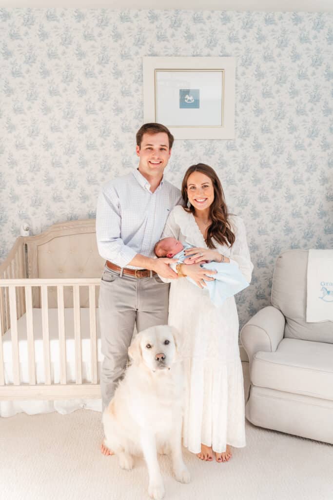 Family portrait in their baby boy's nursery. Cottage Core style.
