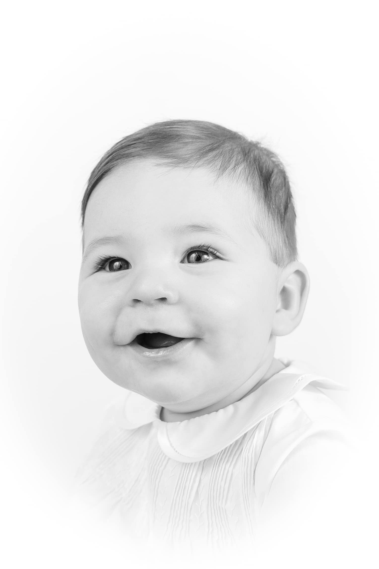 Portrait of baby boy in black and white.