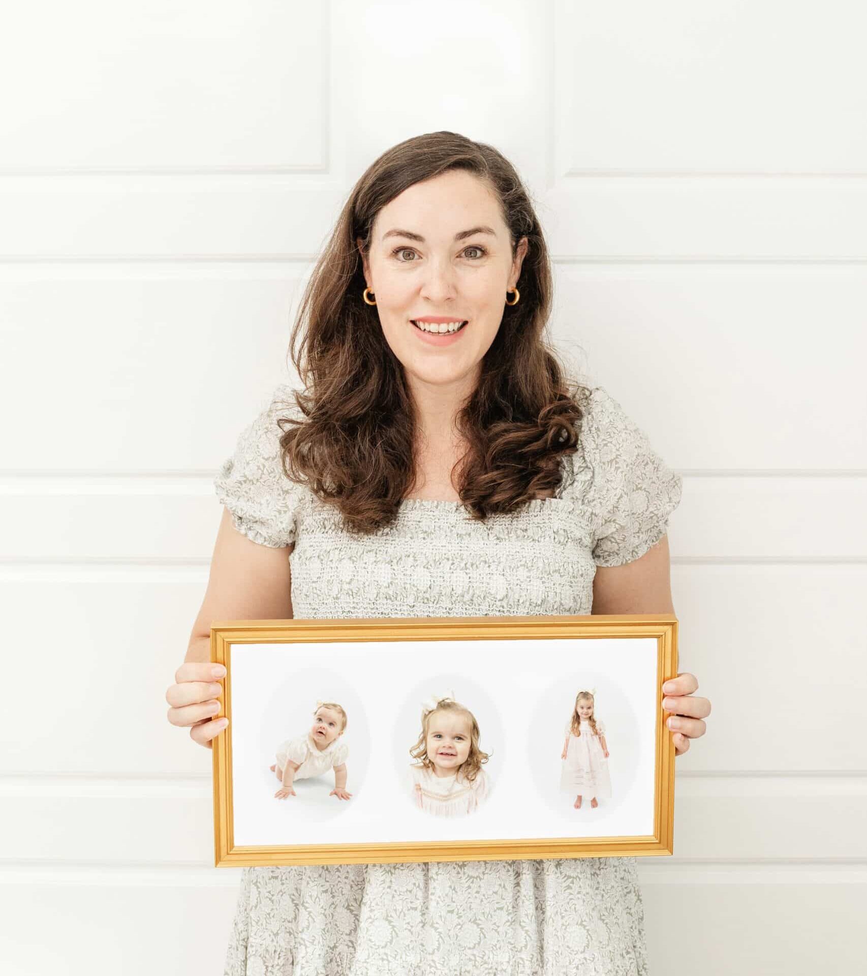 Image of photographer holding composite wall art of heirloom portraits.