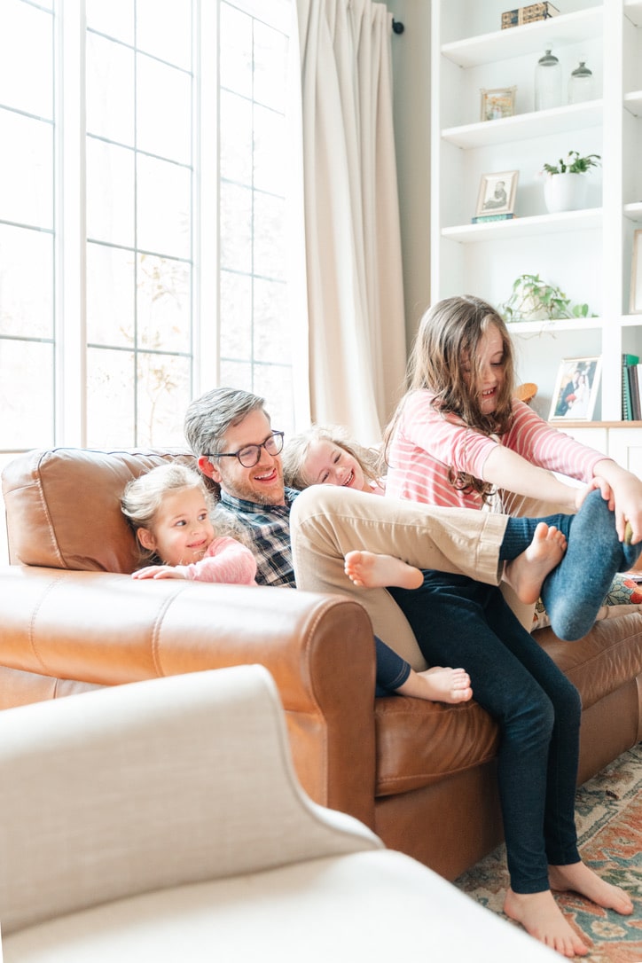 Image taken indoors with higher ISO on a camera without flash to capture a candid moment.