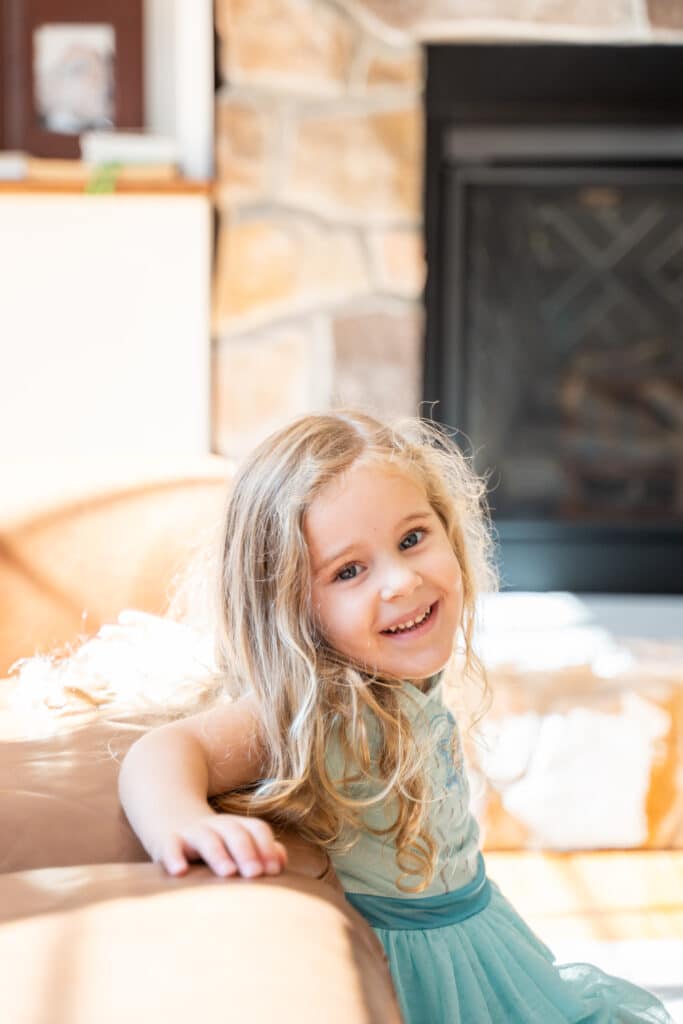 Learn how to take better photos of your kids.  Candid photo of Kelley Hoagland's daughter