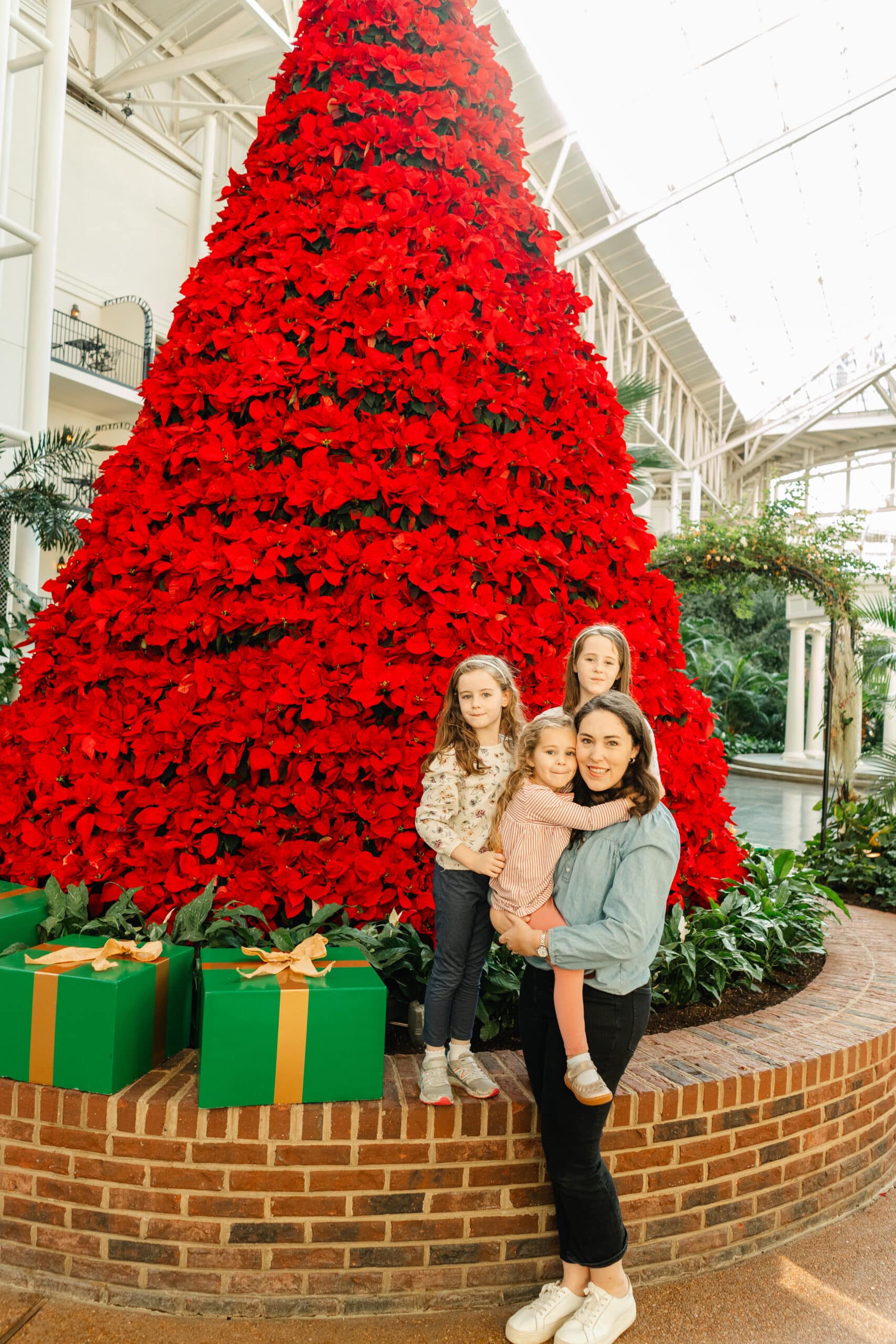 Chattanooga photographer Kelley Hoagland with daughters experiencing Christmas At Opryland Hotel