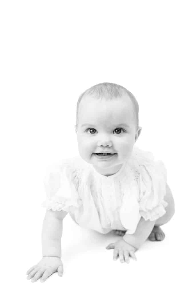 baby crawls in bubble