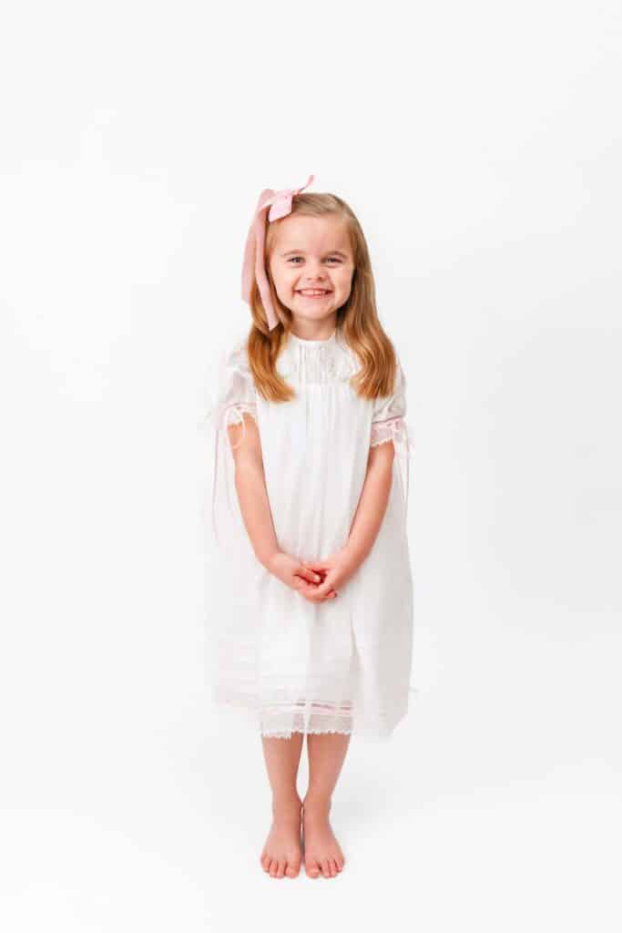 girl wears white dress.
